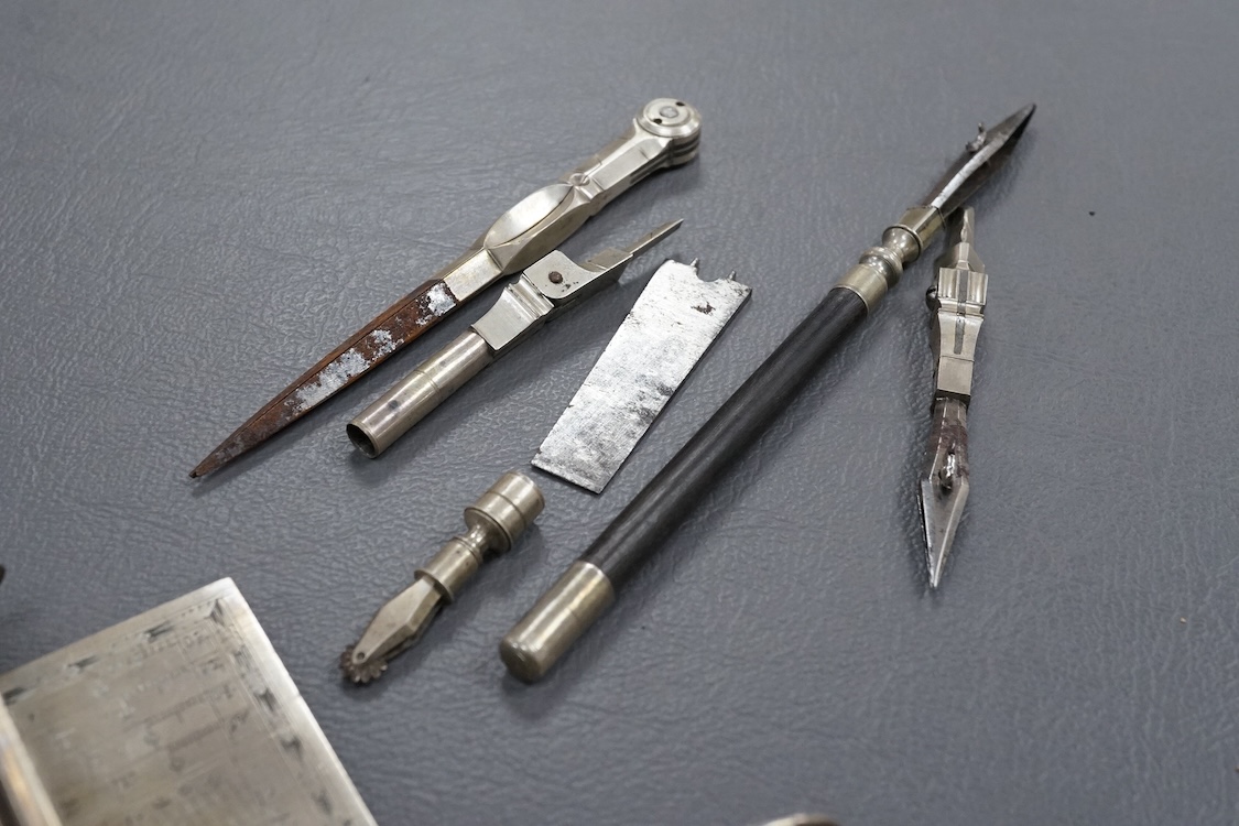An early to mid 19th century pocket draughtsman's set containing steel drawing implements, (several items missing/broken).